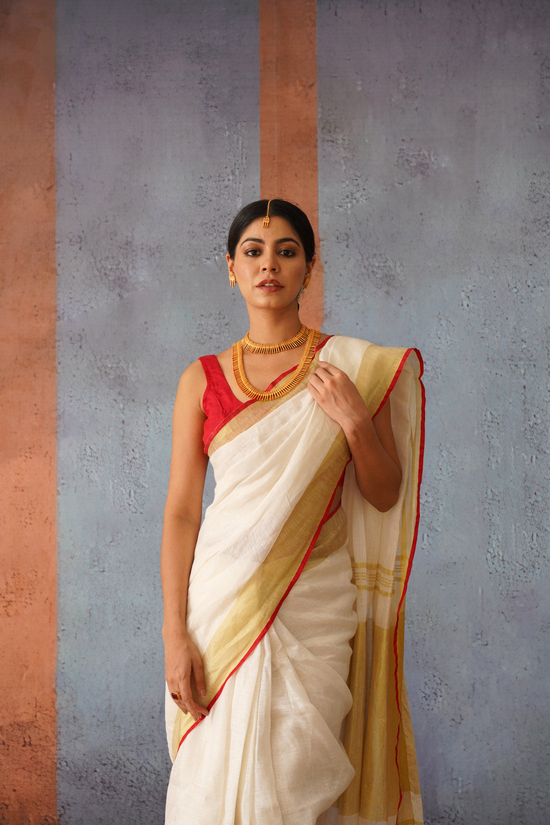 Festive Off White Handloom Linen Sari with Red Border & Gold Zari Pallu