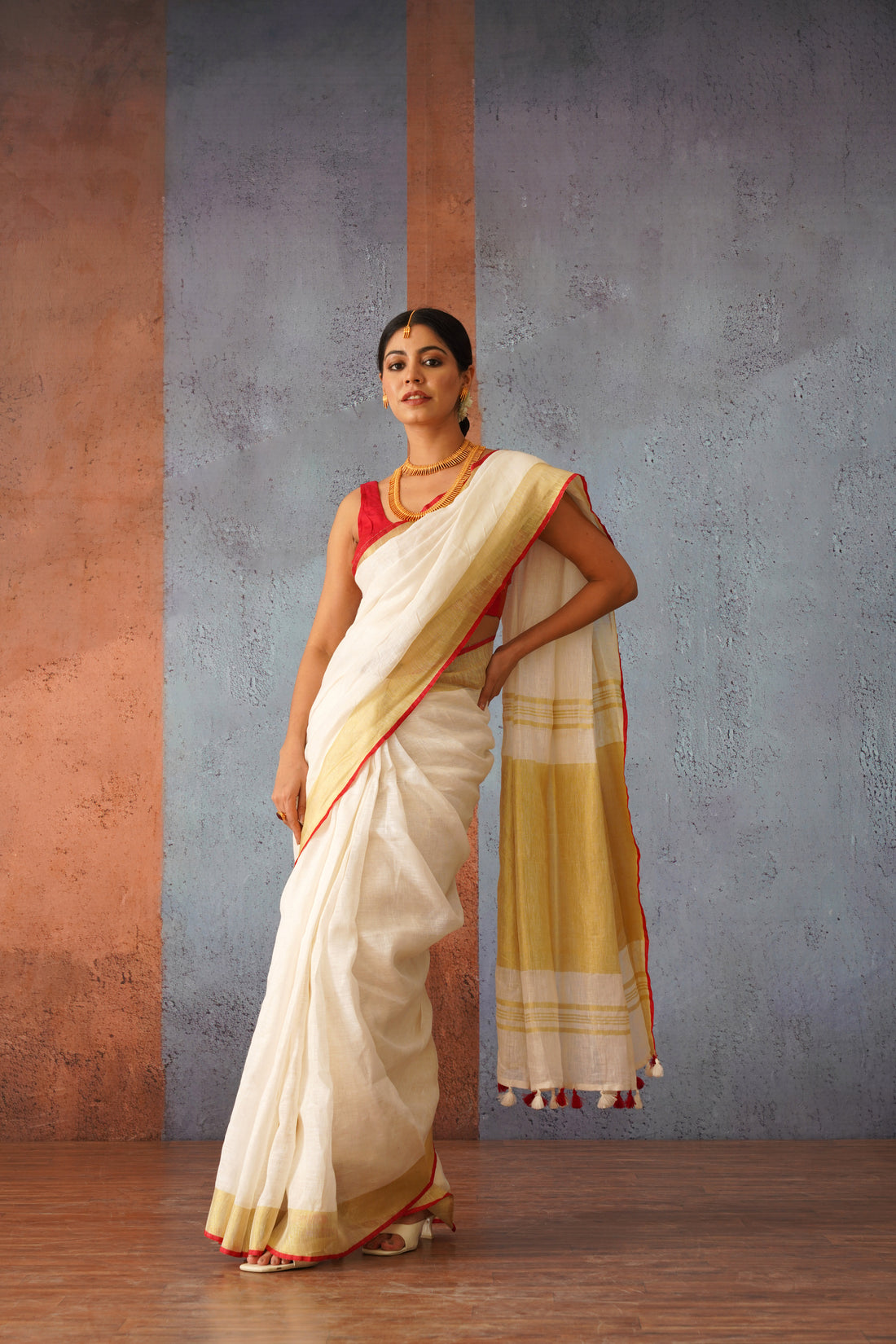 Festive Off White Handloom Linen Sari with Red Border & Gold Zari Pallu
