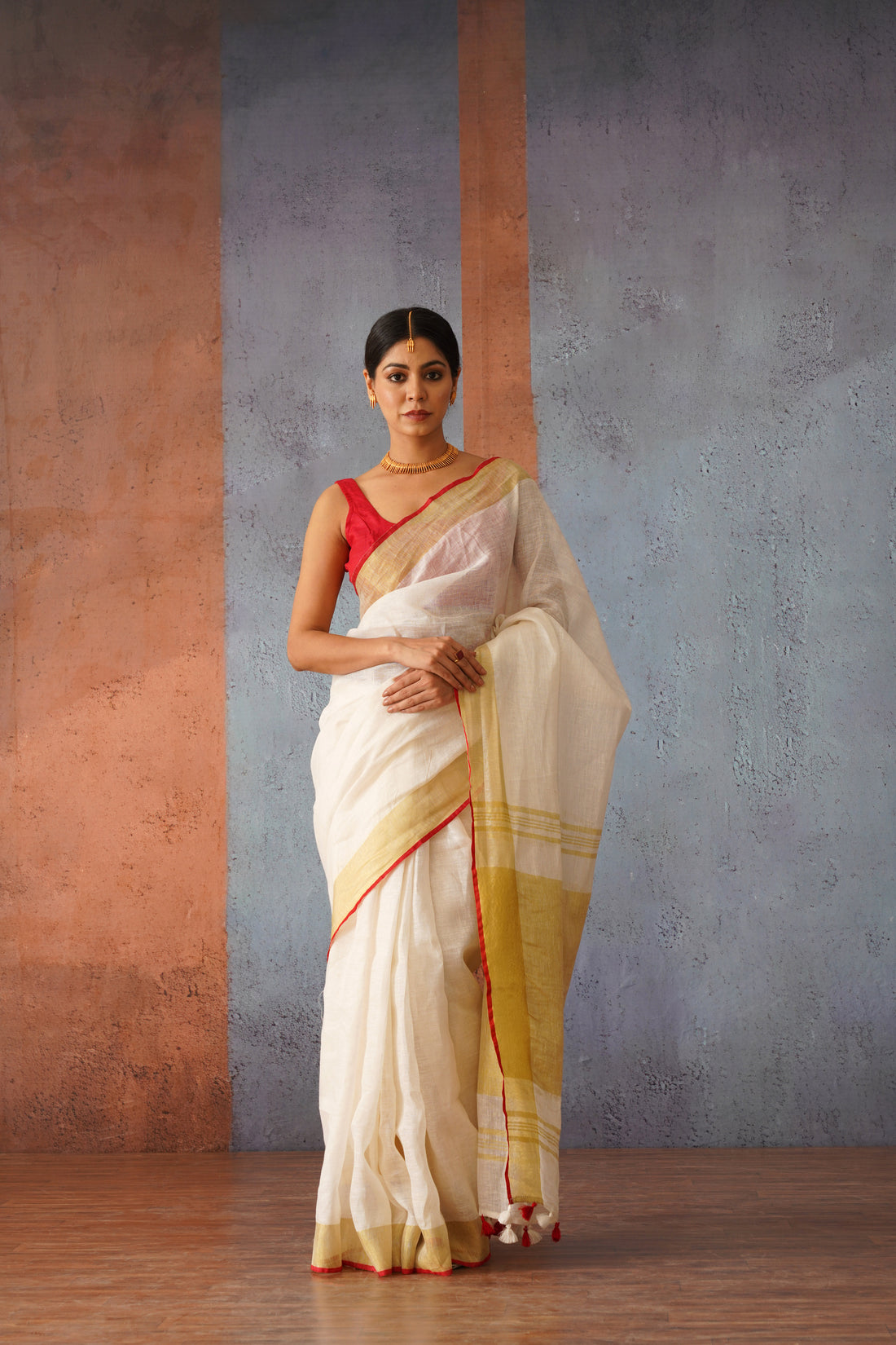 Festive Off White Handloom Linen Sari with Red Border & Gold Zari Pallu