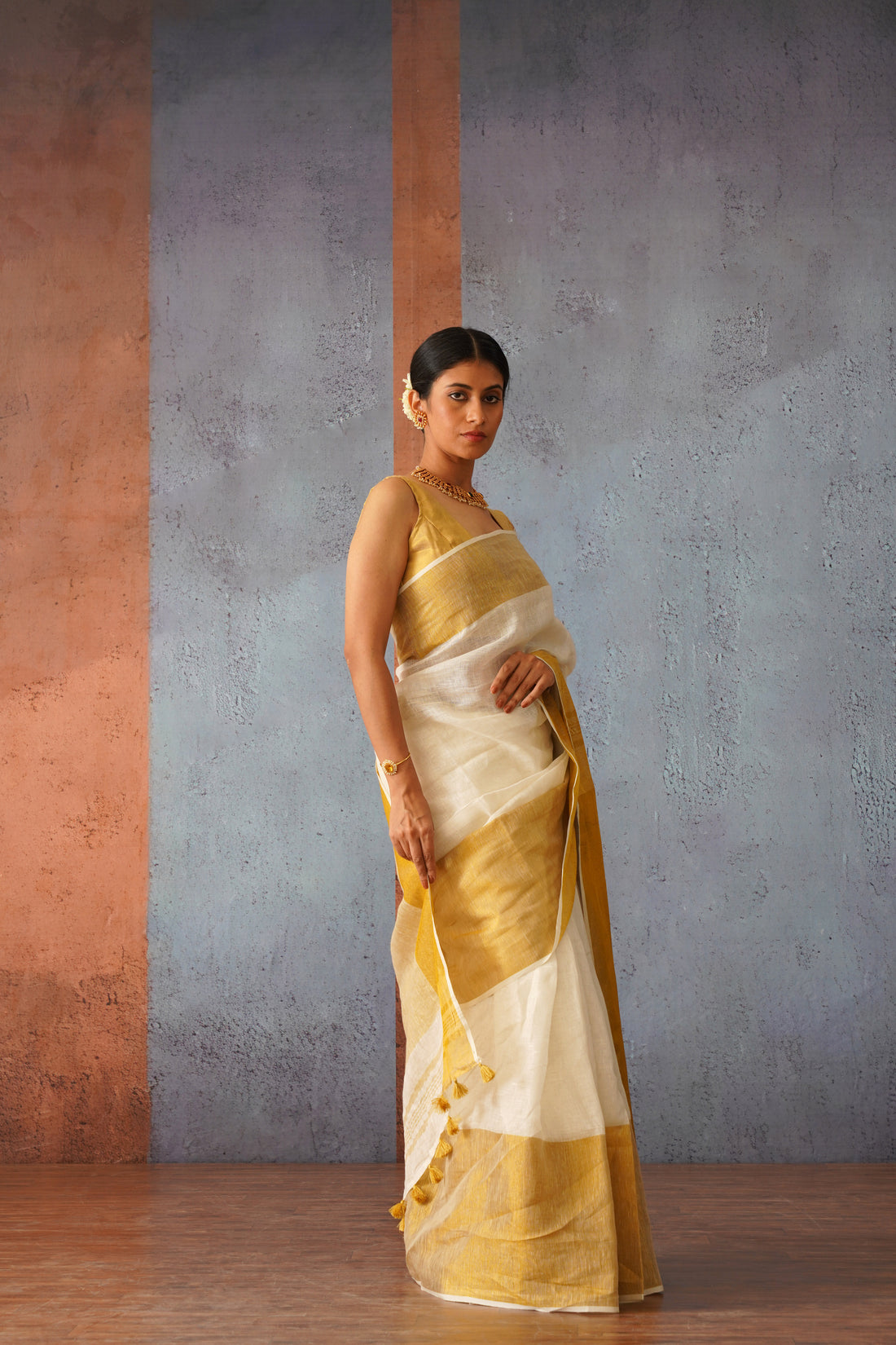 Off White Linen Sari with Gold Zari pallu