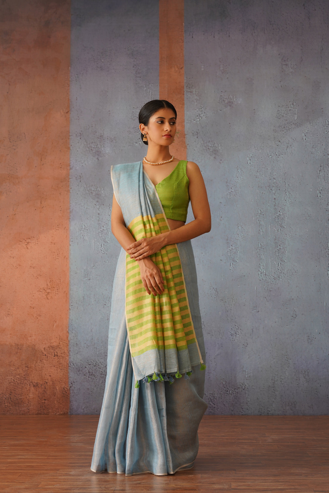 Pastel Blue Linen Zari Sari with Green, Gold Stripe Pallu