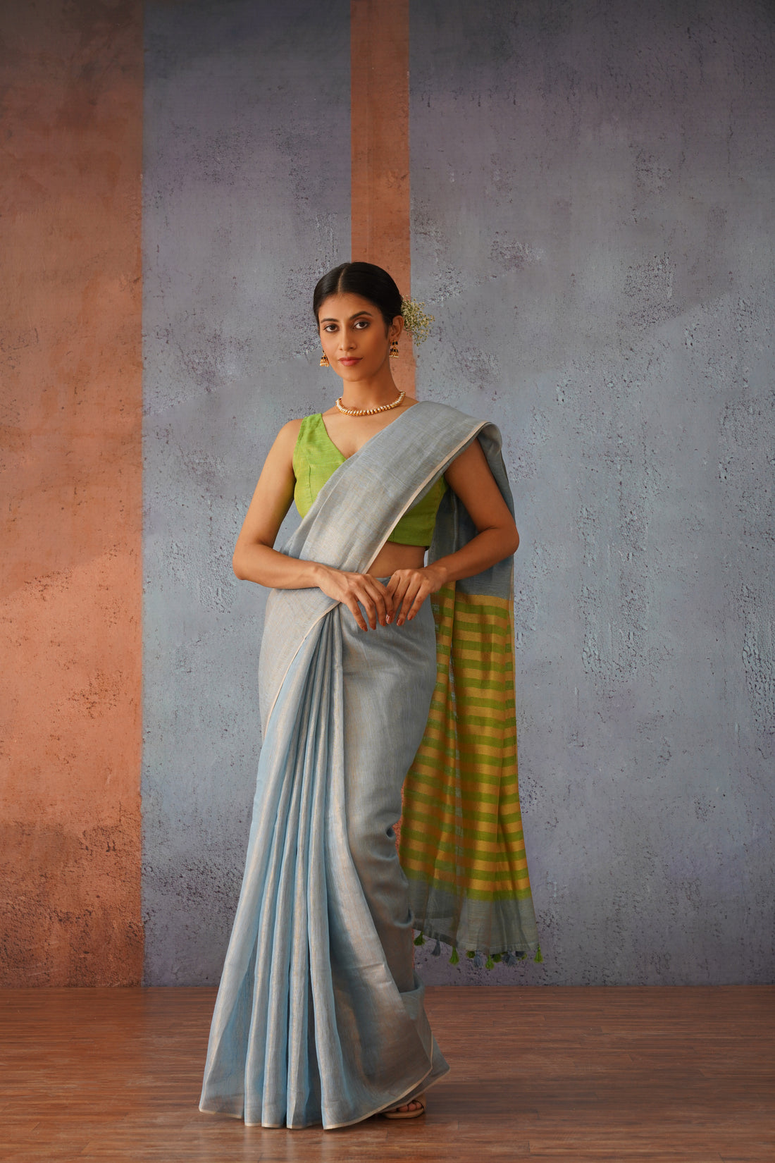 Pastel Blue Linen Zari Sari with Green, Gold Stripe Pallu