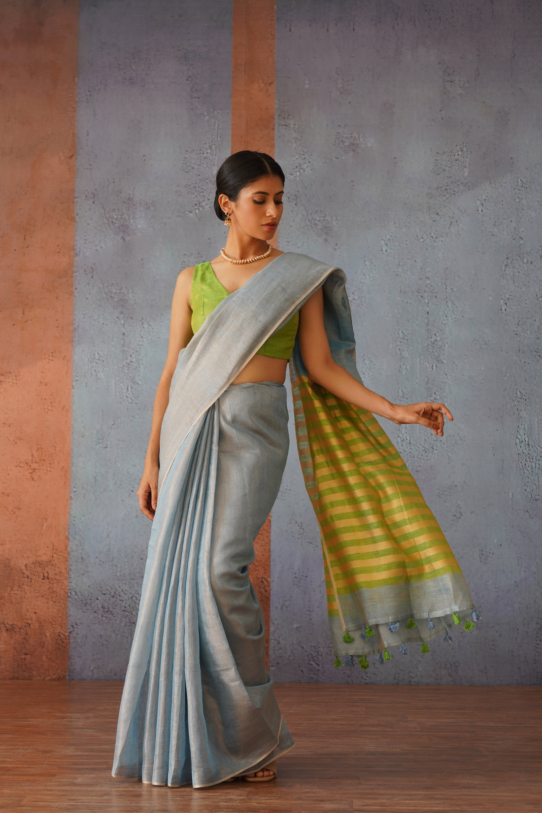 Pastel Blue Linen Zari Sari with Green, Gold Stripe Pallu