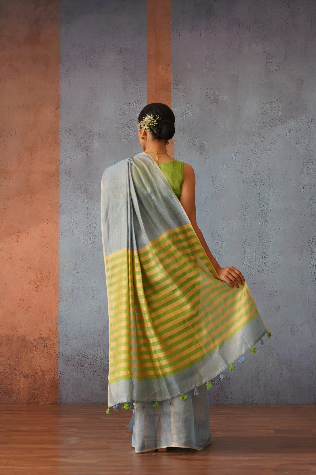 Pastel Blue Linen Zari Sari with Green, Gold Stripe Pallu