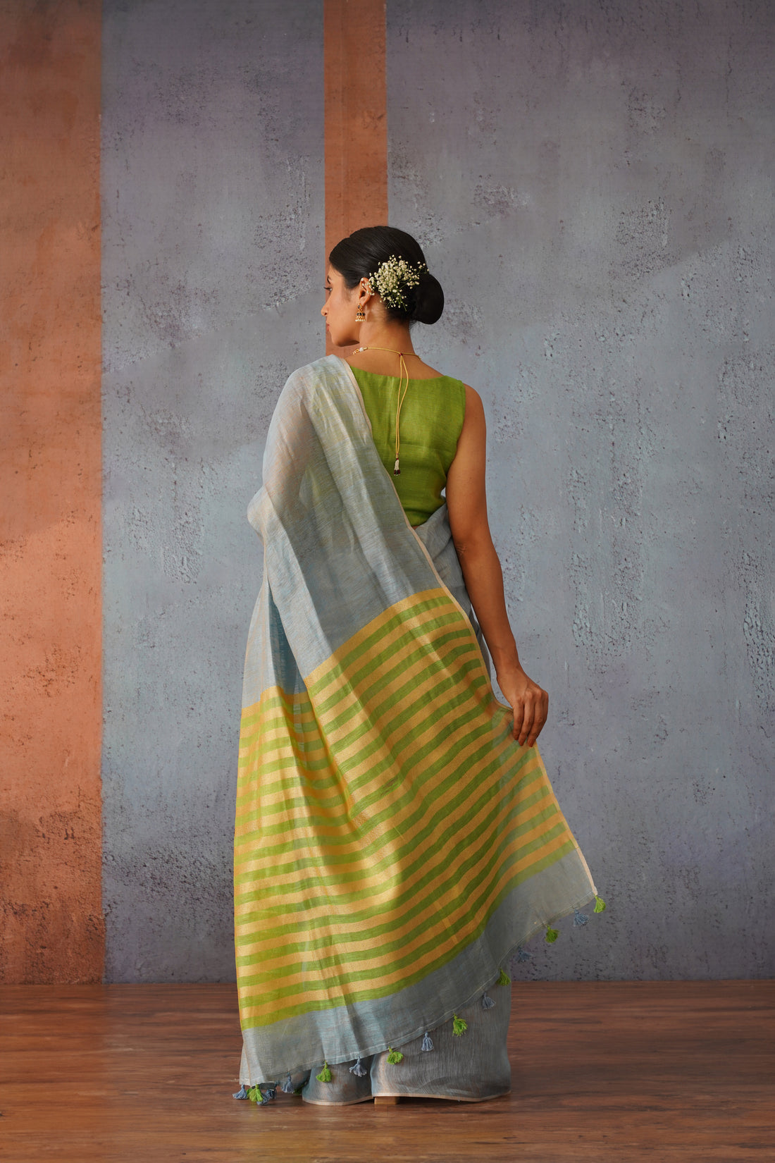 Pastel Blue Linen Zari Sari with Green, Gold Stripe Pallu