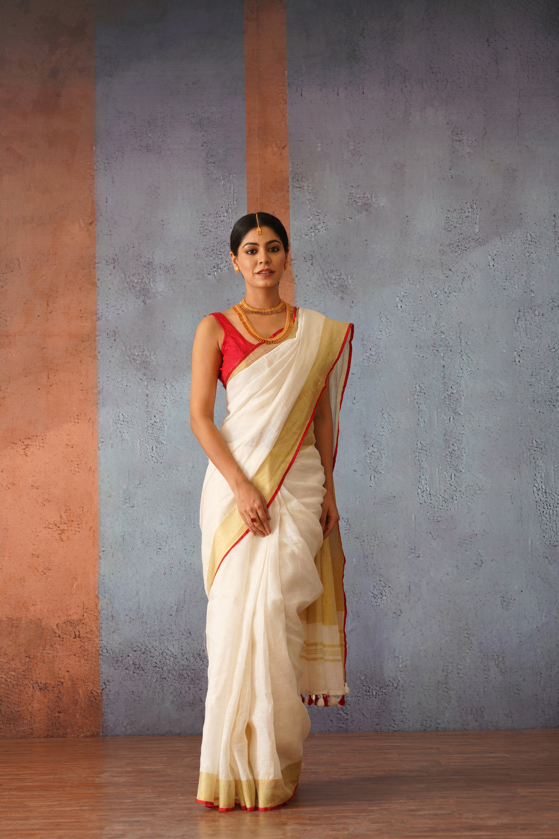 Festive Off White Handloom Linen Sari with Red Border & Gold Zari Pallu