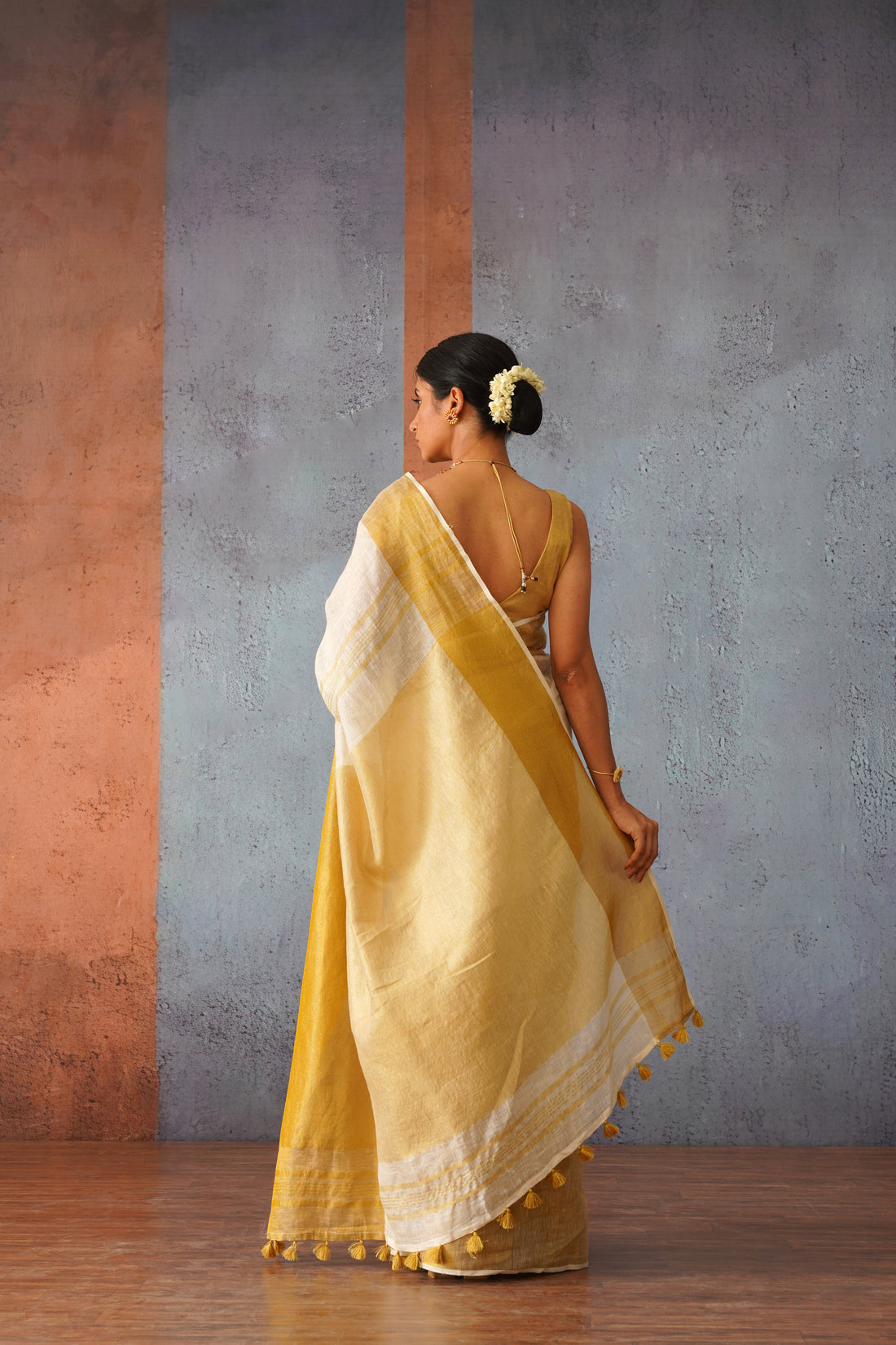 Off White Linen Sari with Gold Zari pallu