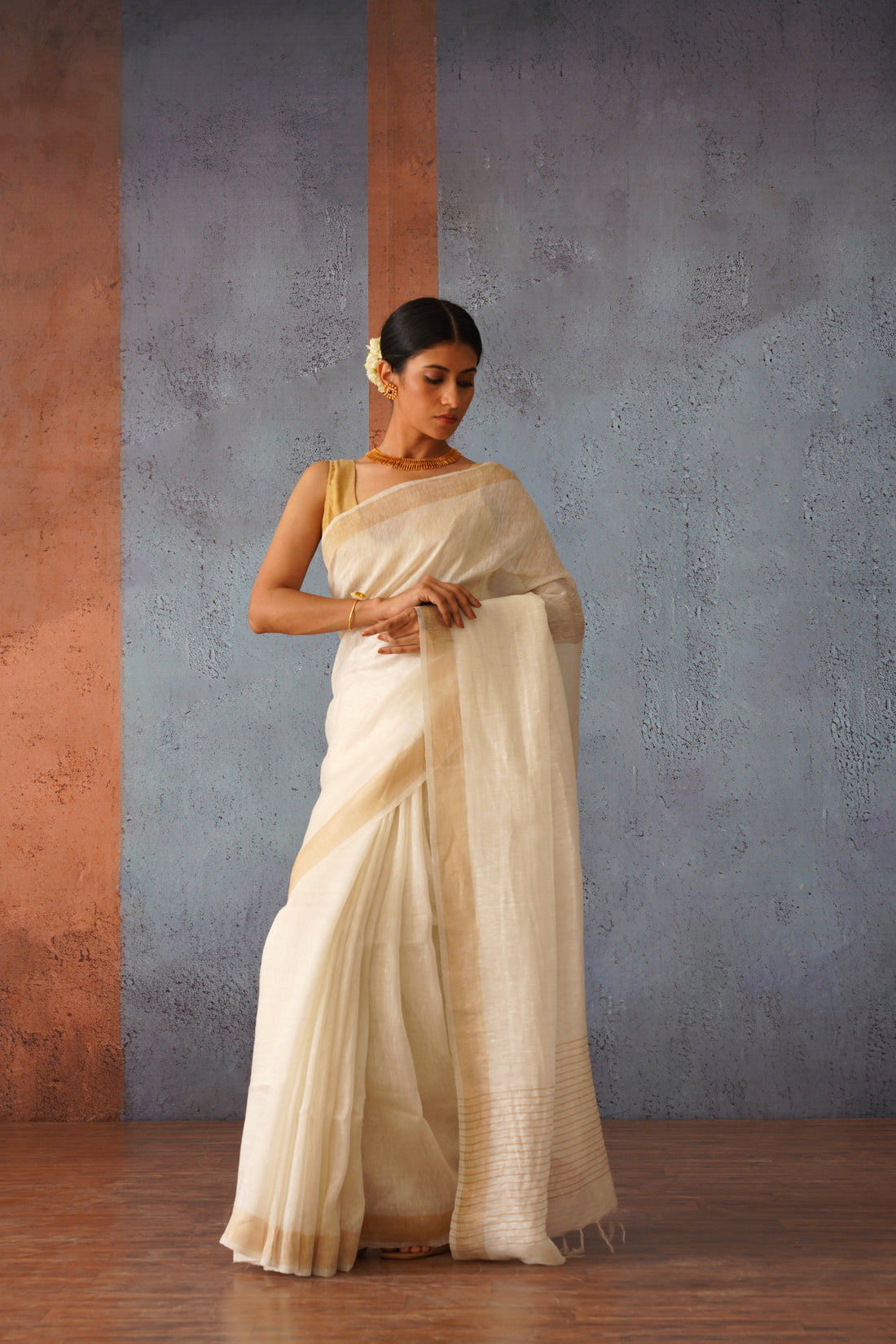 Off White Linen Silk Sari with Gold Zari pallu