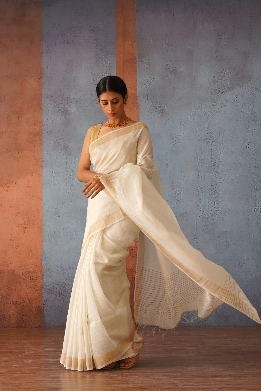 Off White Linen Silk Sari with Gold Zari pallu