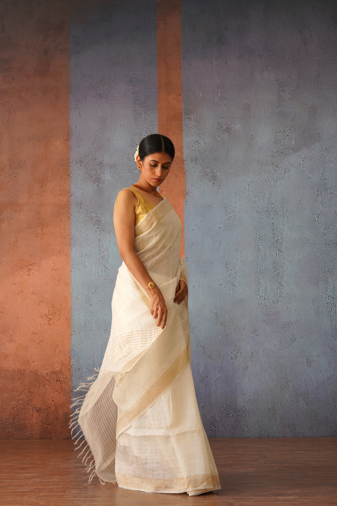 Off White Linen Silk Sari with Gold Zari pallu