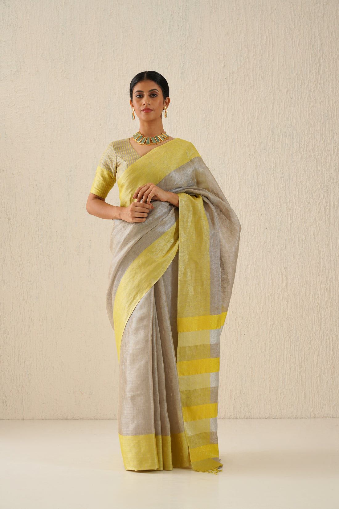 Silver & Yellow Handloom Tissue Linen Sari