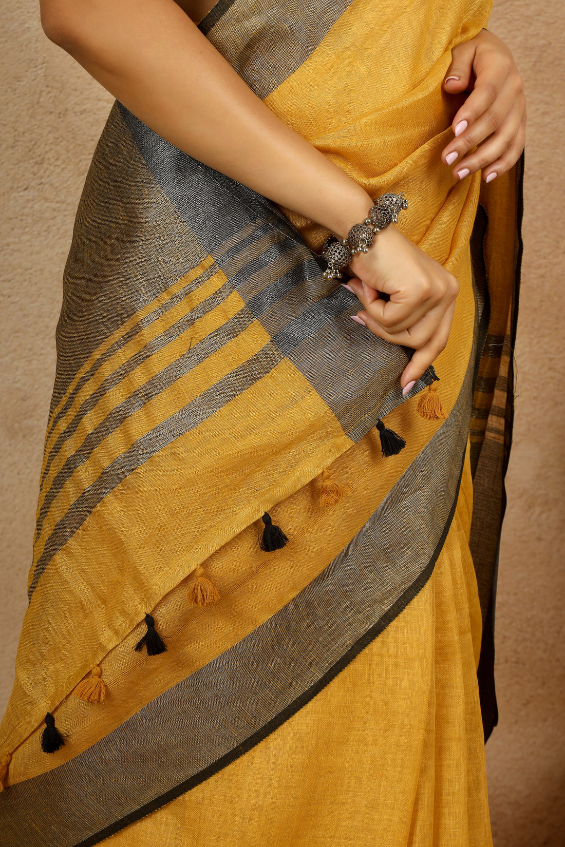 Damini Mustard Linen Sari with Striking Grey Zari pallu